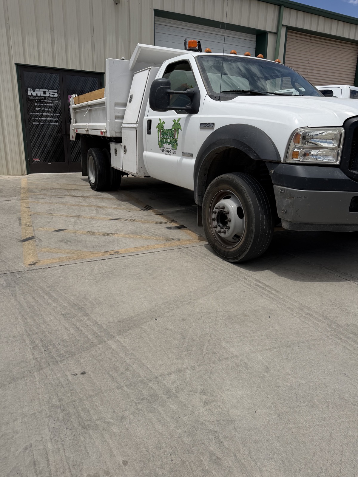 White fleet service truck outside Modern Diesel Solutions in Lake Havasu City